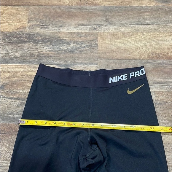 Nike Black and Gold Leggings for Active Comfort - Picture 6 of 14